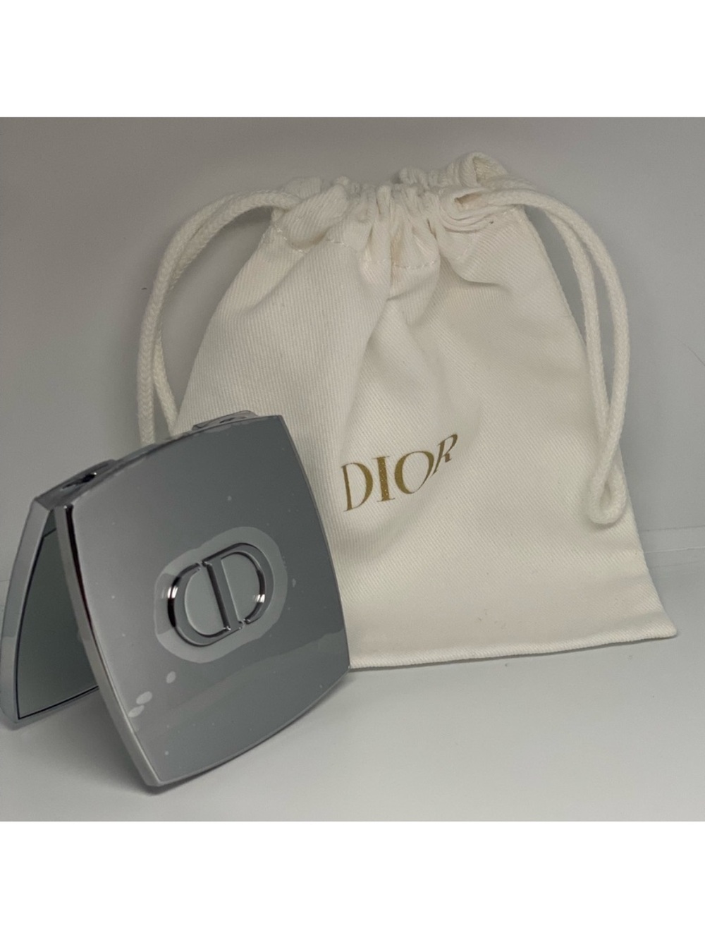 Dior Silver Compact with Cream Pouch